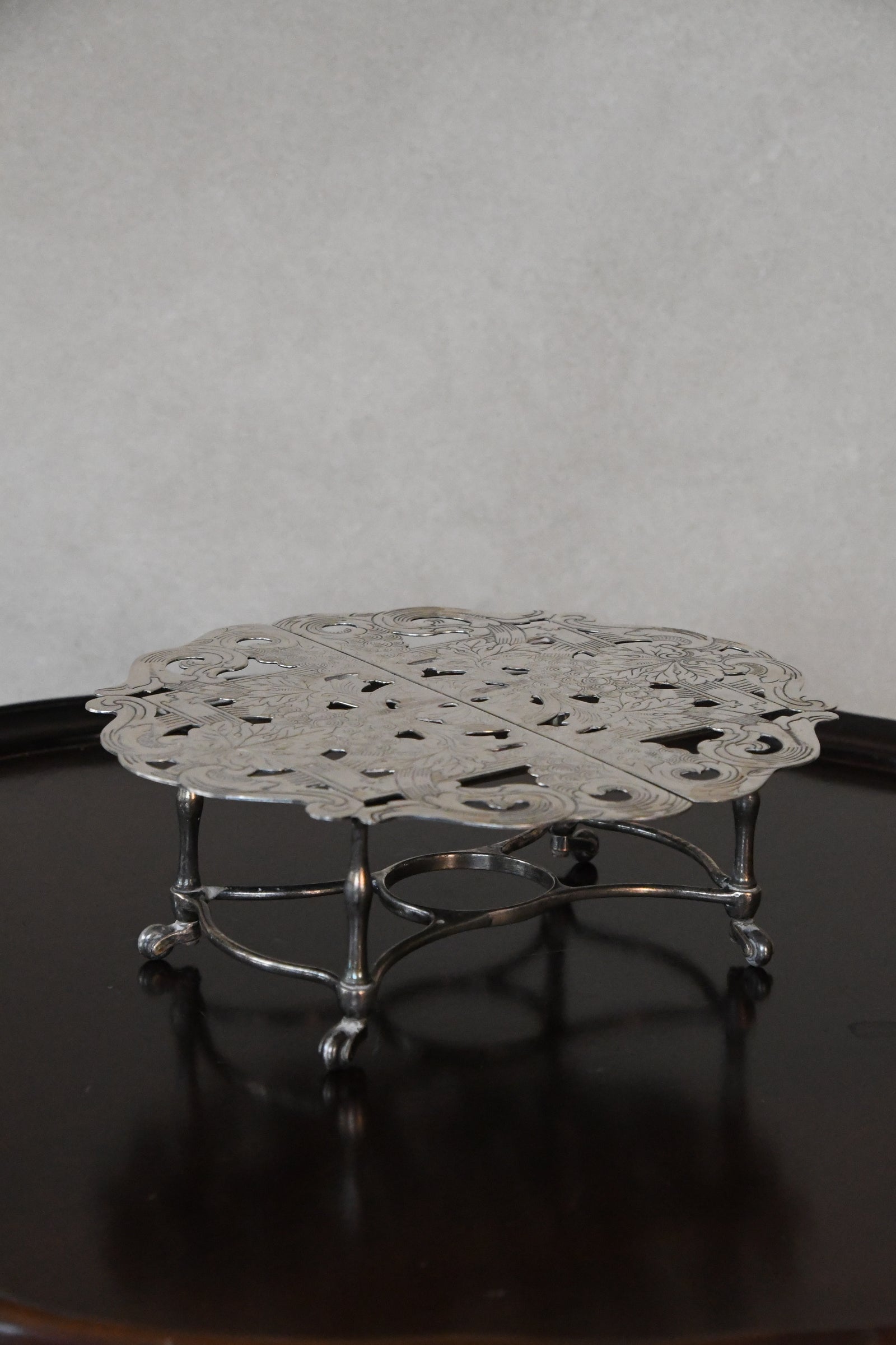 Vintage Silverplate Trivet on Castors
