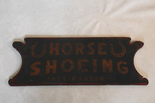 Vintage horse shoeing sign